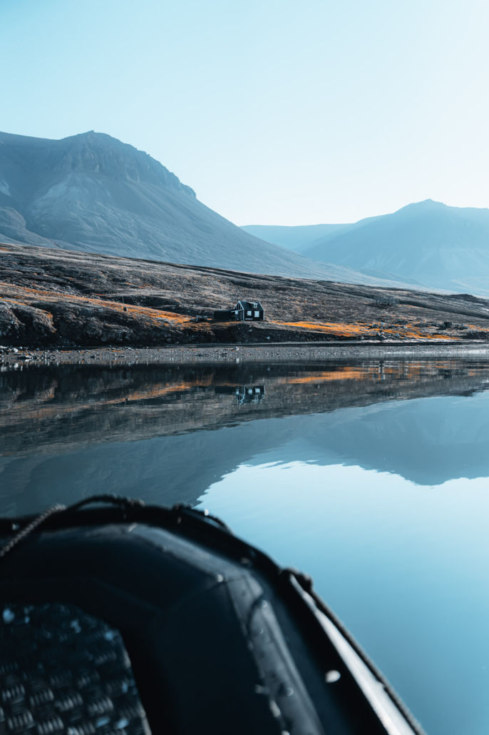 Lone hut on a Greenland fjord