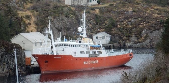 Polarfront, with her red hull, docked at Blomvåg, Norway